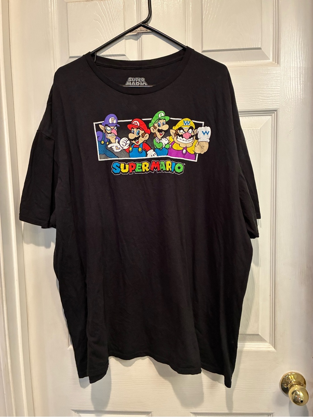 Nintendo Super Mario Black Tee with Colorful Character Panel